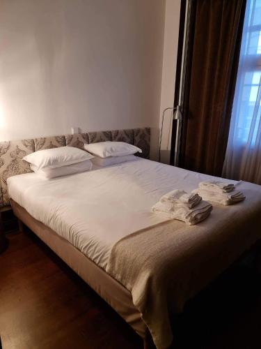 Postel nebo postele na pokoji v ubytování Rosa Biscoito Suites