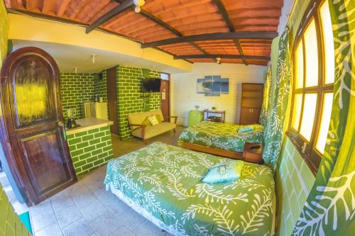 Katil atau katil-katil dalam bilik di Hotel El Mirador KITE-SURF, WIND-SURF AND SURF