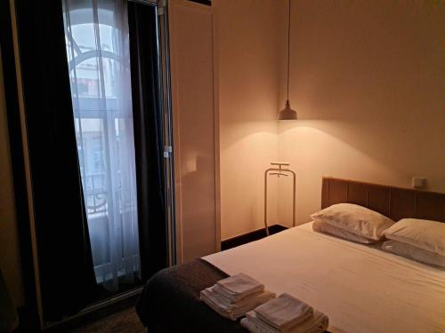 Postel nebo postele na pokoji v ubytování Rosa Biscoito Suites