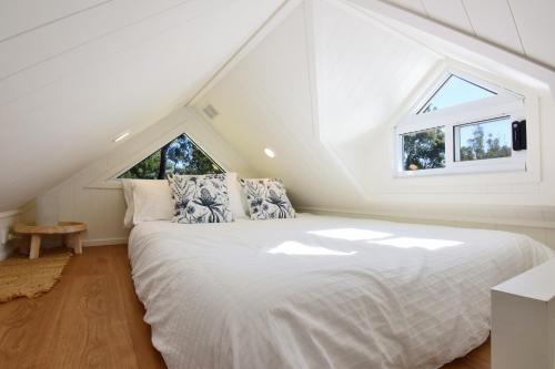 Säng eller sängar i ett rum på Pindari Tiny Home Kangaroo Valley
