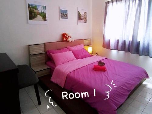 Кровать или кровати в номере STAY N REST SWEET HOME Duyung 207