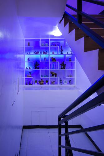a room with a shelf with vases on it at Diamond Hotel And Resto in Catarman