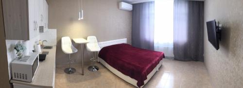 TV a/nebo společenská místnost v ubytování Apartment ЖК Яскравий