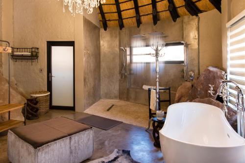 A bathroom at Twyfelfontein Country Lodge