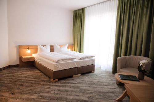 Katil atau katil-katil dalam bilik di Hotel Waldidyll
