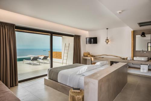 Posteľ alebo postele v izbe v ubytovaní Kefalonian Escape Suites
