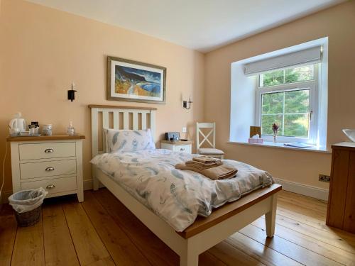 Postel nebo postele na pokoji v ubytování Ewich House B&B