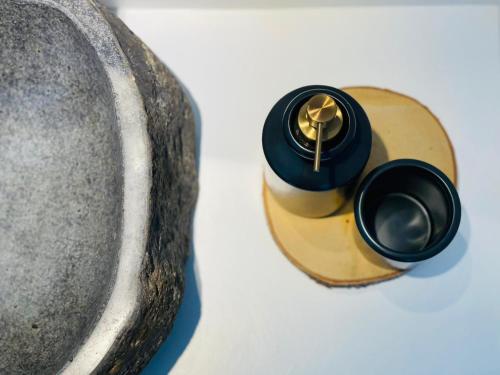 a close up of a brass object next to a sink at Villa Sal - Alvor in Alvor