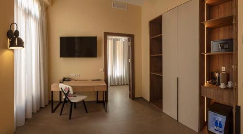 SH Suite Palaceにあるテレビまたはエンターテインメントセンター