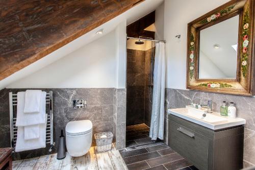 a bathroom with a sink and a shower at ANRÁN at Tidwell Farm in Staverton
