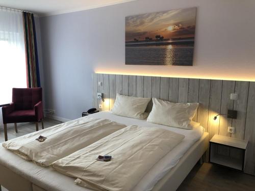 Katil atau katil-katil dalam bilik di MarC5 Hotel Cadenberge