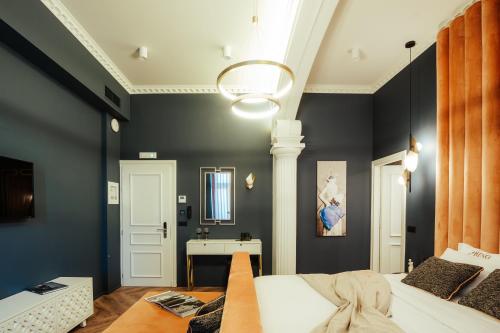 TV a/nebo společenská místnost v ubytování Espero Royal Stay