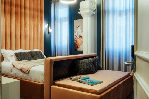 Postel nebo postele na pokoji v ubytování Espero Royal Stay