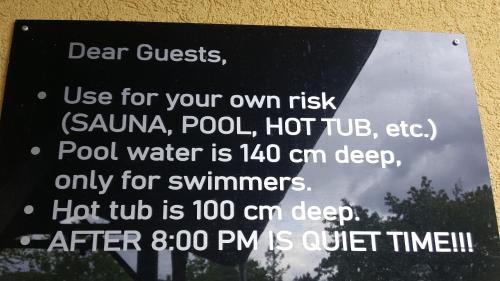 a sign that is posted on a wall at Panorama Buda in Budapest