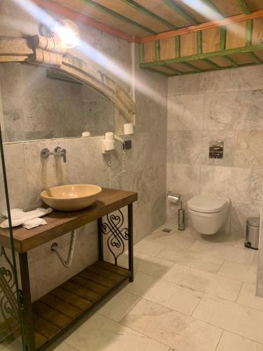 a bathroom with a sink and a toilet at Walnut House in Goreme