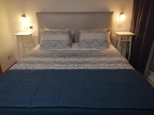 Postel nebo postele na pokoji v ubytování RoyalHeronHouse