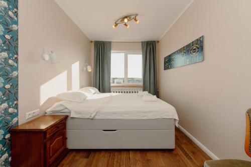 Postel nebo postele na pokoji v ubytování Holyday apartment