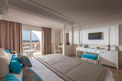 Ένα ή περισσότερα κρεβάτια σε δωμάτιο στο TUI BLUE Palm Beach Palace Djerba - Adult Only