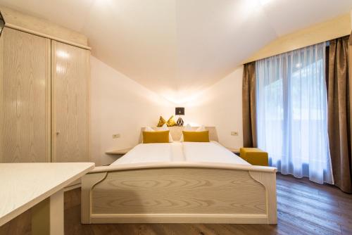 Cama o camas de una habitación en Hotel Sigmunderhof