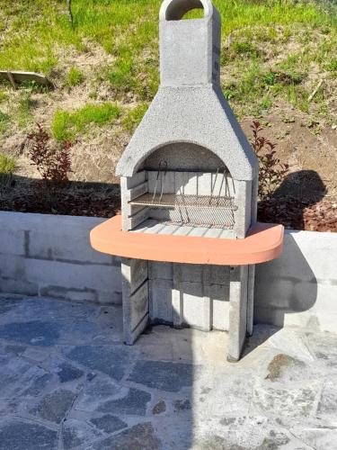 a stone oven sitting on top of a bench at Casa Cinzia Bonassola Cinque Terre in Bonassola