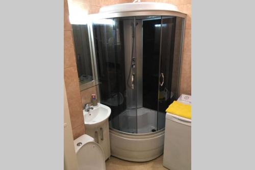a bathroom with a shower and a sink at Latgales 266 6 can stay Self check in out River 200m in Rīga