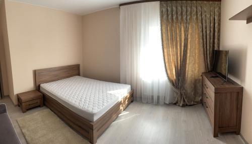 Легло или легла в стая в Затишна однокімнатна квартира під Києвом