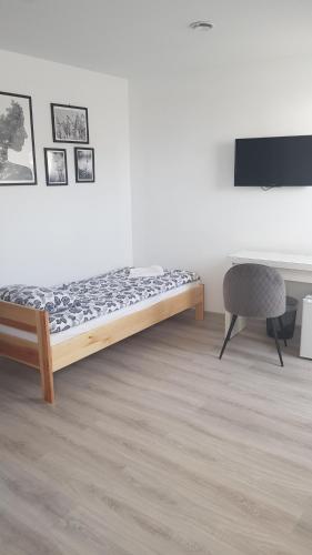 Katil atau katil-katil dalam bilik di Apartamenty i Pokoje DIMAN