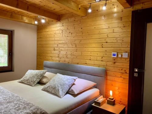 A bed or beds in a room at Grand Spa Holiday Home