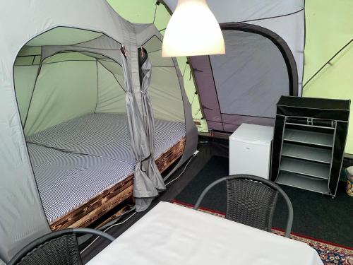 Letto o letti in una camera di Hestkær Family Rooms