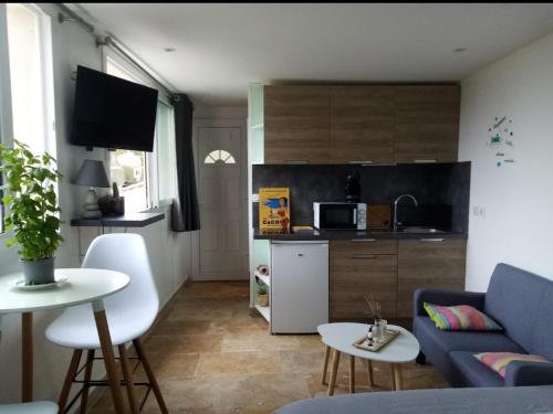 O zonă de relaxare la Studio d'environ 20m2, piscine, vue mer, pour 2 personnes