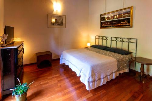 מיטה או מיטות בחדר ב-Casa Quaratesi