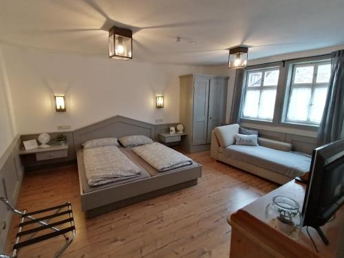 Posezení v ubytování Landhotel Alte Schmiede