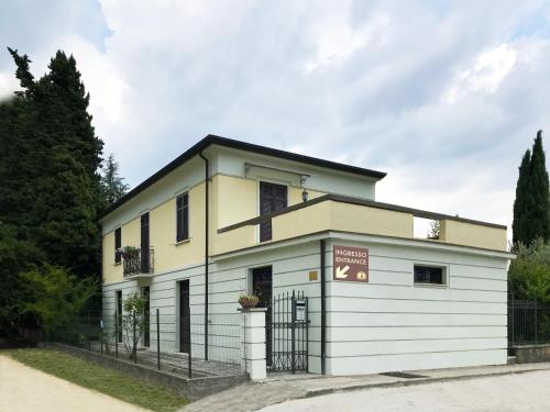 a white building with a black roof at Residenza Nonna Saveria in Sora