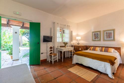 Katil atau katil-katil dalam bilik di Hotel-Apart CORTIJO LAS PIÑAS