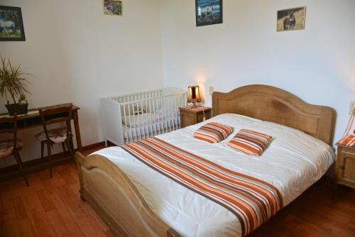 Postel nebo postele na pokoji v ubytování Chez Basile