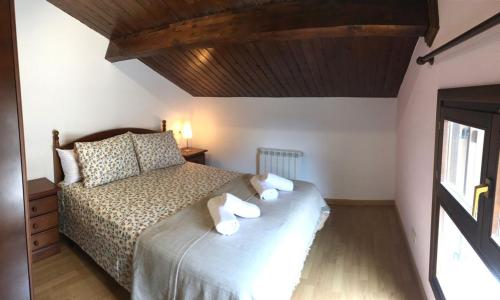 Postel nebo postele na pokoji v ubytování Duplex La Valle Ordesa-Ainsa