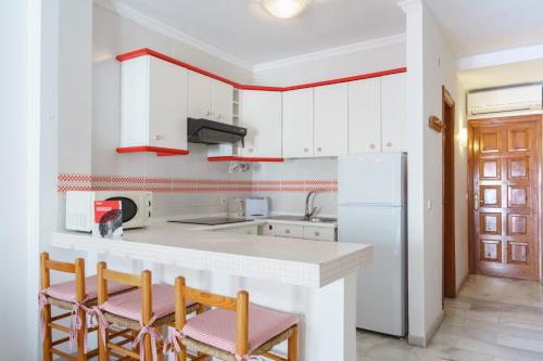 Dapur atau dapur kecil di Apartamentos Pepe Mesa