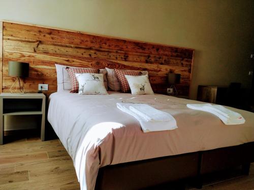 Postel nebo postele na pokoji v ubytování Le Bifore in valle