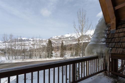 a pile of snow on the balcony of a house at Double Eagle Way 102 in Telluride