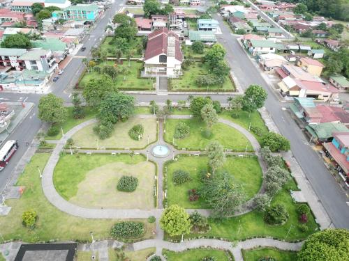 an aerial view of a park in the middle of a city at La Fortuna Lodge by Treebu Hotels in Fortuna