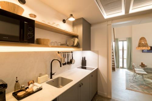 Kuchyň nebo kuchyňský kout v ubytování Hotel Portmany