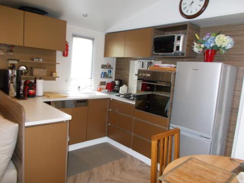 Photo de la galerie de l'établissement mobilhome charme funpass et wifi inclus, à Gastes