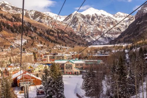 a ski resort in the mountains with a ski lift at Mountain Lodge in Telluride