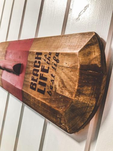 a wooden box is hanging on a wall at Patent, your home in Badacsony in Badacsonytomaj