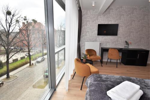 Posezení v ubytování Patio Riverfront Aparthotel