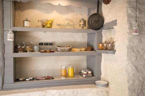 Η κουζίνα ή μικρή κουζίνα στο Maison Lapopie chambres et gîte