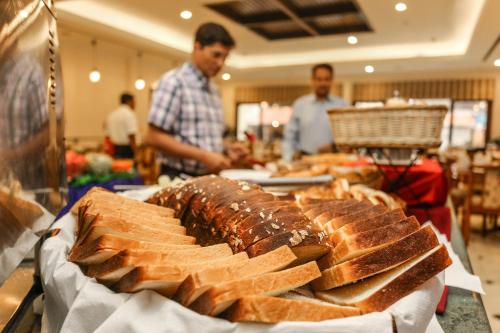 a group of breads on a table in a store at Grand Hotel Kathmandu in Kathmandu