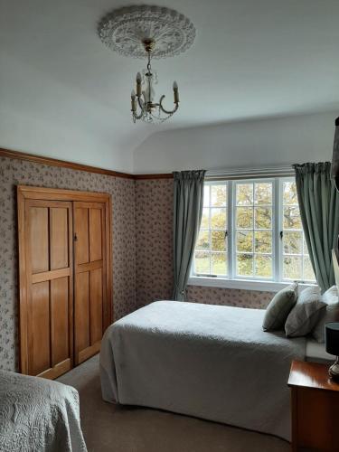 Postel nebo postele na pokoji v ubytování Wainono Homestead