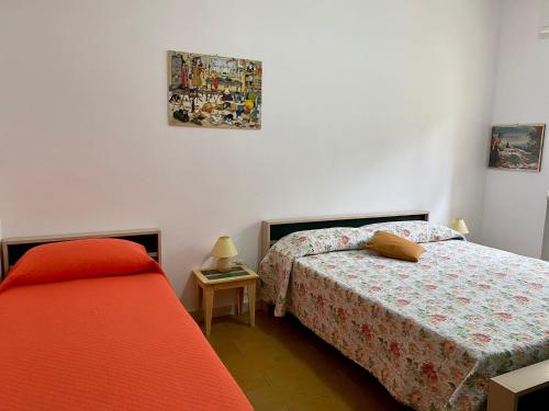 A bed or beds in a room at Residence Mare Verde