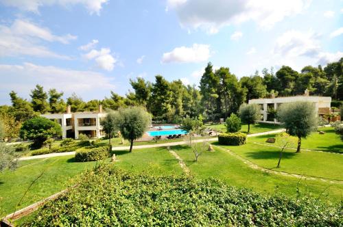 an image of a villa with a garden at Sani Polyastron Hotel & Spa in Sani Beach